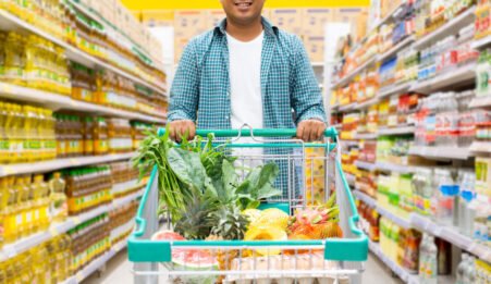 man shopping in supermarket